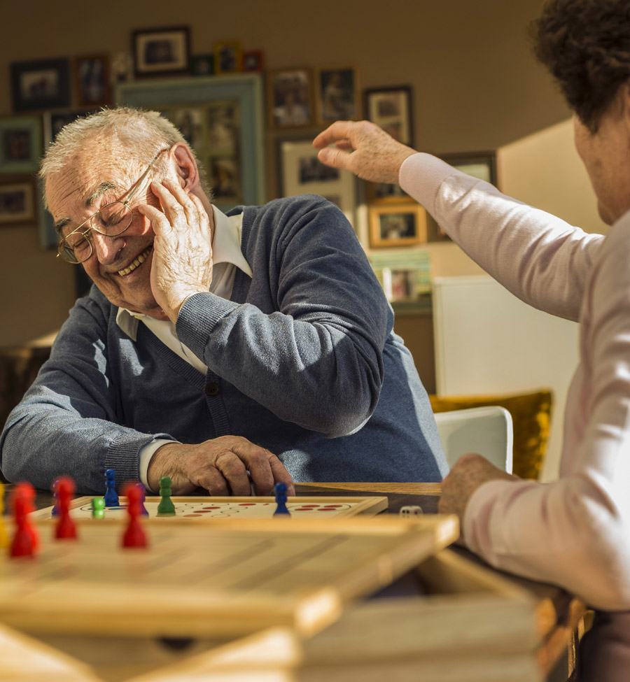 Mature couple enjoying a game of chess