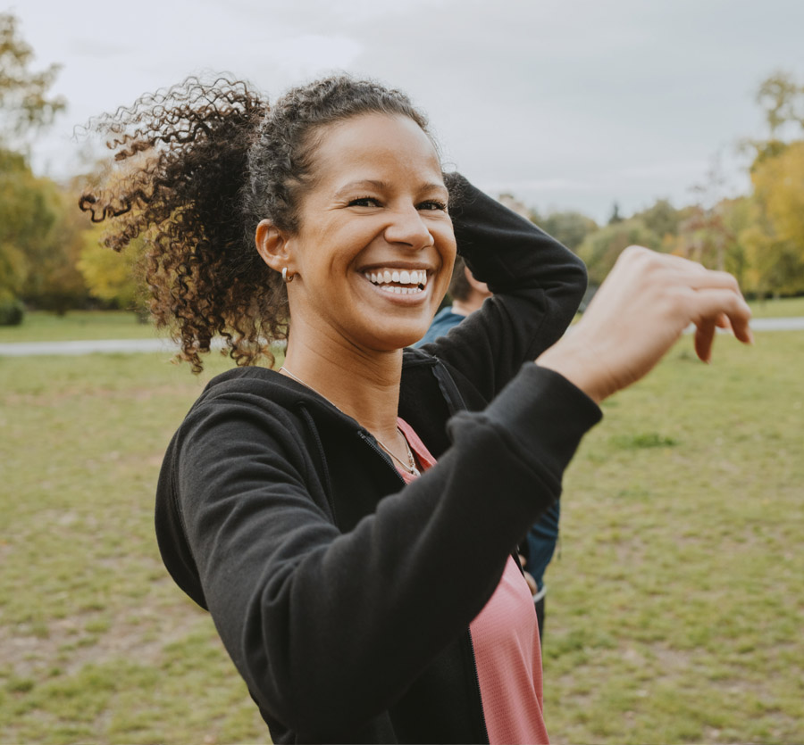 Active woman smiling outdoors