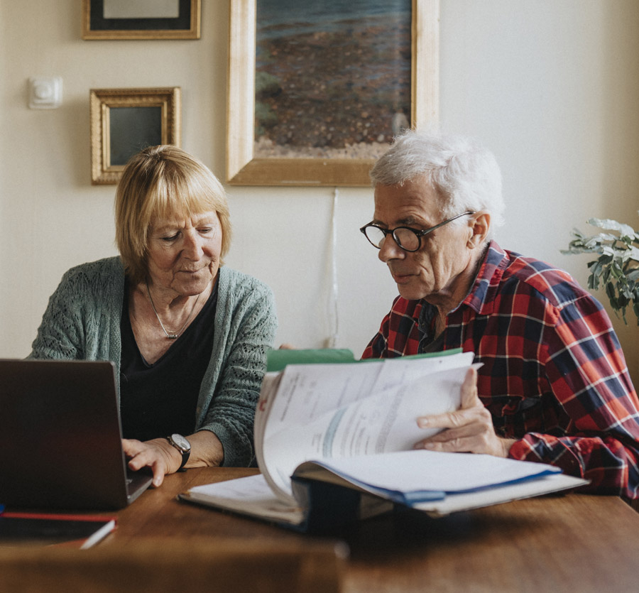 Mature couple working on finances